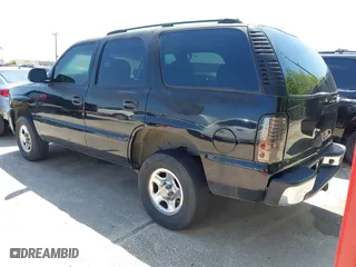 2005 Chevrolet Tahoe LS with VIN 1GNEC13VX5R180270, listed as a IAAI auction lot 42004969 with 164,258 mi miles. Bid and sale history available at carsss.com. Image 3.