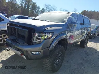 2021 Nissan Titan Pro-4X with VIN 1N6AA1ED0MN504654, listed as a IAAI auction lot 41240824 with 68,533 mi miles and . Bid and sale history available at DreamBid. Image 2.