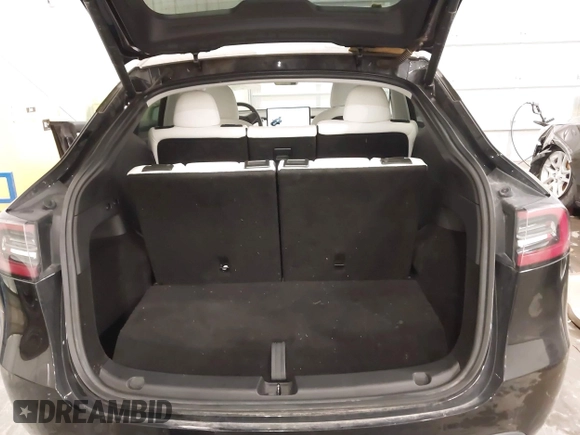 2021 Tesla Model Y Long Range with VIN 5YJYGAEE5MF305655, listed as a IAAI auction lot 41860993 with 50,750 mi miles. Bid and sale history available at carsss.com. Image 19.