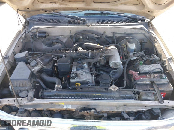 2002 Toyota Tacoma z VIN 5TEVL52NX2Z143074, wystawiony jako IAAI lot #42379132 z przebiegiem 288 039 mil mil oraz . Historia ofert i sprzedaży dostępna na DreamBid. Obrazek 10.