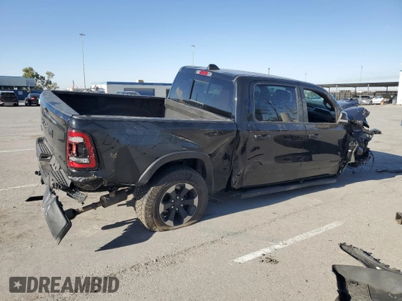 2020 Ram 1500 Rebel with VIN 1C6SRFLT6LN141838, listed as a Copart auction lot 54799315 with 79,654 mi miles and Salvage title. Bid and sale history available at DreamBid. Image 3.