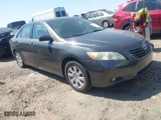 2007 Toyota Camry CE with VIN 4T1BE46K27U059804, listed as a IAAI auction lot 41914392 with 130,313 mi miles. Bid and sale history available at carsss.com. Image 1.