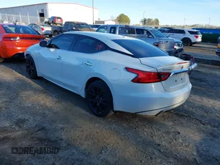 2016 Nissan Maxima SL with VIN 1N4AA6AP7GC447276, listed as a IAAI auction lot 41336384 with 135,033 mi miles and . Bid and sale history available at DreamBid. Image 3.