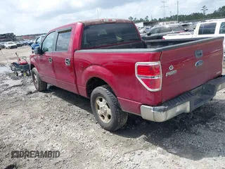 2014 Ford F-150 XL with VIN 1FTFW1CF9EFA85164, listed as a IAAI auction lot 41940709 with 262,185 mi miles. Bid and sale history available at carsss.com. Image 3.