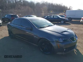 2009 Pontiac G8 GT with VIN 6G2EC57YX9L221534, listed as a IAAI auction lot 41227662 with 130,941 mi miles. Bid and sale history available at carsss.com. Image 1.