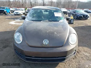 2012 Volkswagen Beetle 2.5L PZEV with VIN 3VWJP7AT9CM609099, listed as a IAAI auction lot 41396554 with 151,393 mi miles. Bid and sale history available at carsss.com. Image 12.