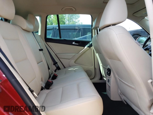 2012 Volkswagen Tiguan SE z VIN WVGAV7AXXCW005665, wystawiony jako Copart lot #58413145 z przebiegiem 197 505 mil mil oraz Tytuł czysty. Historia ofert i sprzedaży dostępna na DreamBid. Obrazek 11.