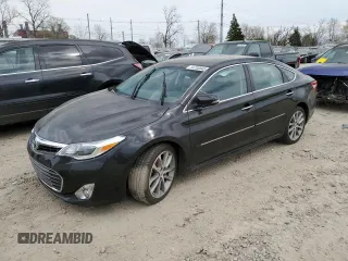 2015 Toyota Avalon Limited with VIN 4T1BK1EBXFU162931, listed as a Copart auction lot 54708945 with 84,375 mi miles and Clean Title. Bid and sale history available at carsss.com. Image 1.
