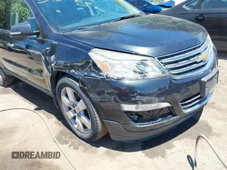 2015 Chevrolet Traverse LTZ with VIN 1GNKVJKDXFJ279029, listed as a IAAI auction lot 39694033 with 151,241 mi miles and . Bid and sale history available at DreamBid. Image 6.