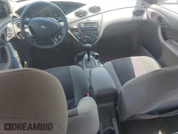 2003 Ford Focus SE with VIN 1FAFP34353W231334, listed as a Copart auction lot 63844205 with 86,601 mi miles and Salvage title. Bid and sale history available at DreamBid. Image 8.