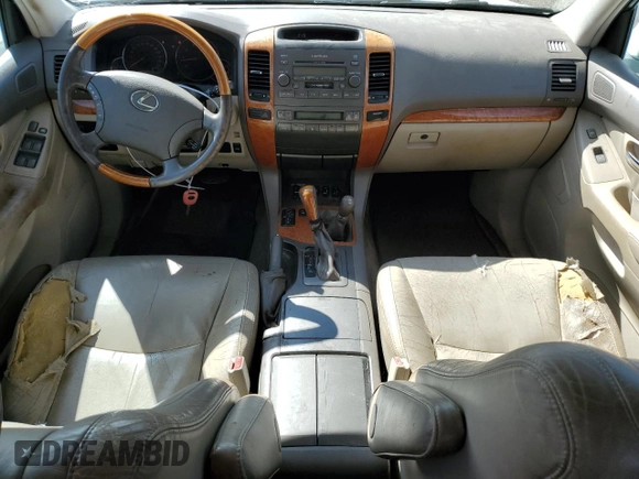 2004 Lexus GX 470 with VIN JTJBT20XX40033938, listed as a Copart auction lot 70871164 with 214,565 mi miles and Salvage Title. Bid and sale history available at carsss.com. Image 8.