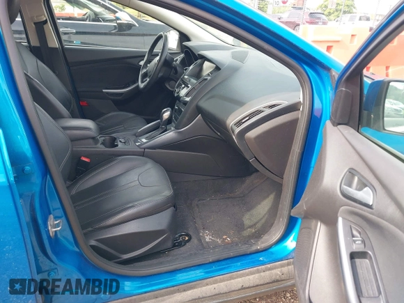 2014 Ford Focus Titanium with VIN 1FADP3N28EL119791, listed as a IAAI auction lot 42712044 with 144,338 mi miles and . Bid and sale history available at DreamBid. Image 5.