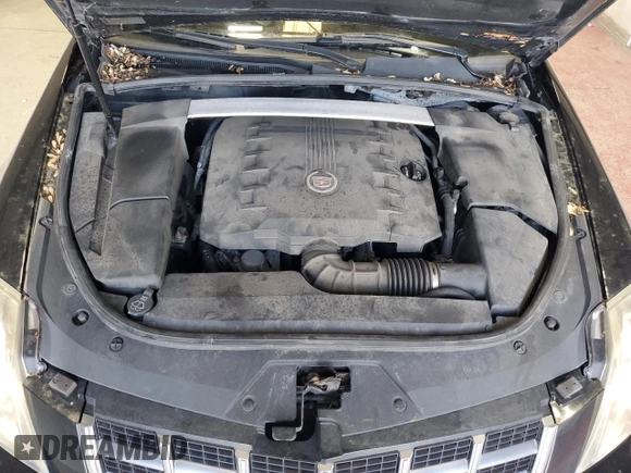 2013 Cadillac CTS Luxury z VIN 1G6DG5E57D0112818, wystawiony jako Copart lot #57937755 z przebiegiem 148 751 mil mil oraz Czysty tytuł • Clean title. Historia ofert i sprzedaży dostępna na DreamBid. Obrazek 11.