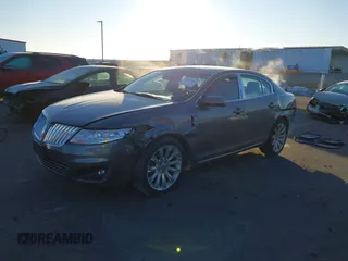 2012 Lincoln MKS with VIN 1LNHL9ER0CG801671, listed as a IAAI auction lot 41287565 with 137,903 mi miles. Bid and sale history available at carsss.com. Image 2.