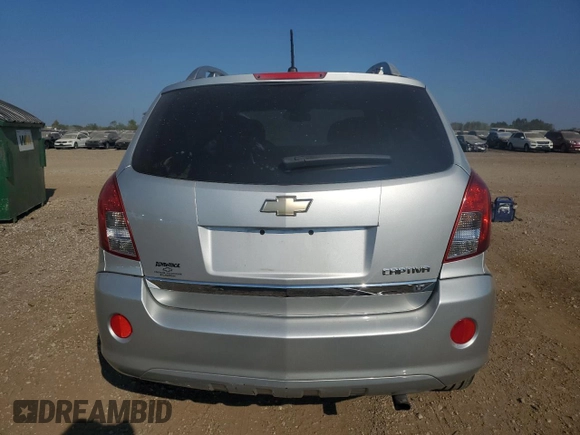 2015 Chevrolet Captiva Sport LT with VIN 3GNAL3EK7FS511382, listed as a Copart auction lot 68749624 with 143,922 mi miles and Salvage Title. Bid and sale history available at DreamBid. Image 6.