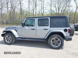 2018 Jeep Wrangler Unlimited Sahara with VIN 1C4HJXEG4JW141540, listed as a IAAI auction lot 42148402 with 43,909 mi miles and . Bid and sale history available at DreamBid. Image 14.