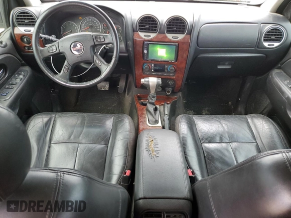 2006 GMC Envoy SLT with VIN 1GKDS13S362197312, listed as a Copart auction lot 83999074 with 217,220 mi miles and Clean Title. Bid and sale history available at carsss.com. Image 8.