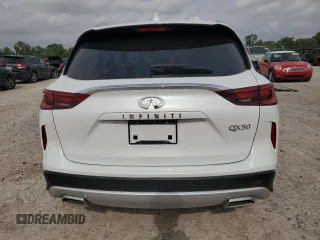 2023 Infiniti QX50 Luxe with VIN 3PCAJ5BA3PF114574, listed as a Copart auction lot 55118255 with 25,803 mi miles and Salvage title. Bid and sale history available at DreamBid. Image 6.
