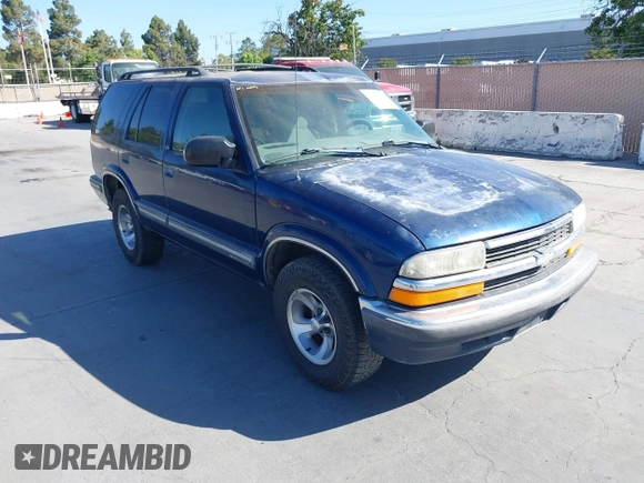 1999 Chevrolet Blazer LS z VIN 1GNCS13W0X2125101, wystawiony jako IAAI lot #42311277 z przebiegiem Nie podano mil oraz . Historia ofert i sprzedaży dostępna na DreamBid. Obrazek 1.