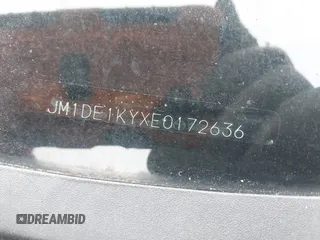 2014 Mazda 2 Sport z VIN JM1DE1KYXE0172636, wystawiony jako IAAI lot #42114251 z przebiegiem 129 346 mil mil oraz . Historia ofert i sprzedaży dostępna na DreamBid. Obrazek 9.