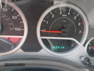 2009 Jeep Wrangler Rubicon z VIN 1J8GA64169L743008, wystawiony jako IAAI lot #41792451 z przebiegiem 142 414 mil mil oraz . Historia ofert i sprzedaży dostępna na DreamBid. Obrazek 7.