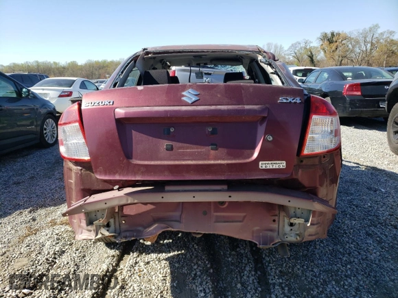 2011 Suzuki SX4 LE with VIN JS2YC5A21B6303222, listed as a Copart auction lot 50426895 with 56,236 mi miles and Salvage Title. Bid and sale history available at carsss.com. Image 6.
