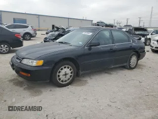 1997 Honda Accord EX with VIN 1HGCD5666VA021674, listed as a Copart auction lot 79078944 with 214,766 mi miles and Salvage Title. Bid and sale history available at carsss.com. Image 1.