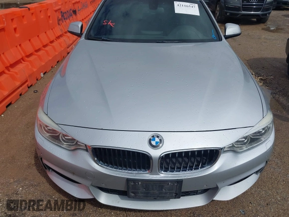 2015 BMW 4 Series 428i xDrive with VIN WBA4C9C50FD330482, listed as a IAAI auction lot 42116547 with 192,739 mi miles and . Bid and sale history available at DreamBid. Image 6.