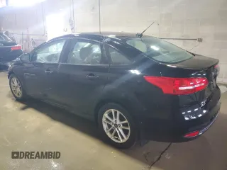 2016 Ford Focus SE with VIN 1FADP3F29GL371728, listed as a Copart auction lot 48871195 with 87,079 mi miles and Salvage Title. Bid and sale history available at carsss.com. Image 2.