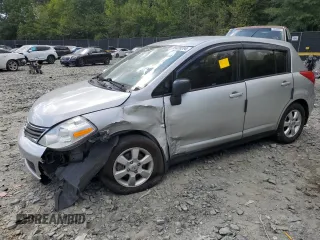 2011 Nissan Versa 1.8 S with VIN 3N1BC1CP2BL429874, listed as a Copart auction lot 70429314 with 136,531 mi miles and Salvage Title. Bid and sale history available at carsss.com. Image 1.