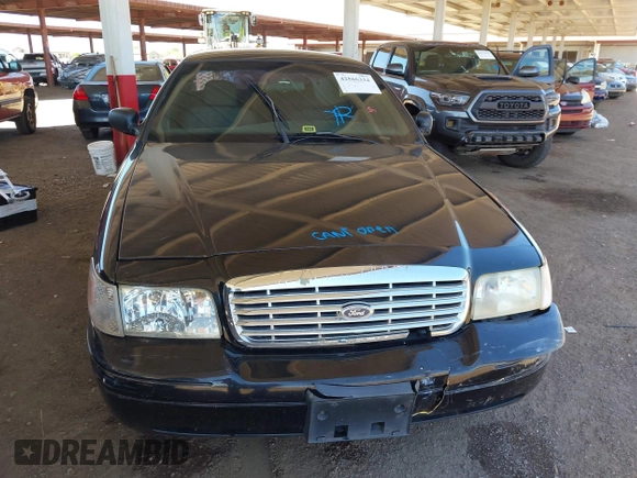 2007 Ford Police Interceptor with VIN 2FAFP71W27X115458, listed as a IAAI auction lot 42566334 with 213,435 mi miles and . Bid and sale history available at DreamBid. Image 12.