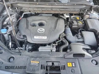 2023 Mazda CX-5 Signature with VIN JM3KFBXY8P0258573, listed as a Copart auction lot 42615075 with 18,916 mi miles and Salvage Title. Bid and sale history available at carsss.com. Image 12.