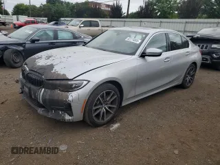 2021 BMW 3 Series 330i xDrive with VIN WBA5R7C0XMFK36218, listed as a Copart auction lot 62274005 with 47,467 mi miles and Salvage title. Bid and sale history available at DreamBid. Image 1.