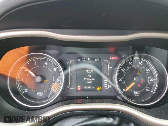 2015 Jeep Cherokee Sport with VIN 1C4PJLAB8FW761989, listed as a Copart auction lot 56869675 with 181,347 mi miles and Salvage title. Bid and sale history available at DreamBid. Image 9.