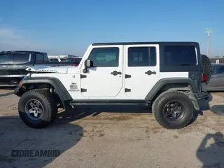2013 Jeep Wrangler Unlimited Rubicon with VIN 1C4BJWFG0DL529739, listed as a IAAI auction lot 41587047 with 93,116 mi miles. Bid and sale history available at carsss.com. Image 14.