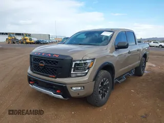 2021 Nissan Titan Pro-4X with VIN 1N6AA1ED9MN519749, listed as a IAAI auction lot 41948962 with 65,807 mi miles and . Bid and sale history available at DreamBid. Image 6.