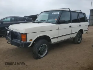1987 Land Rover Range Rover z VIN SALHV1140HA281209, wystawiony jako Copart lot #57767045 z przebiegiem 141 410 mil mil oraz Czysty tytuł • Clean title. Historia ofert i sprzedaży dostępna na DreamBid. Obrazek 1.