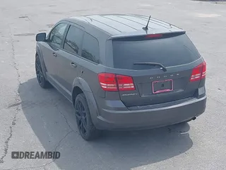 2015 Dodge Journey SE z VIN 3C4PDCAB4FT675074, wystawiony jako IAAI lot #42059878 z przebiegiem 99 947 mil mil oraz . Historia ofert i sprzedaży dostępna na DreamBid. Obrazek 13.