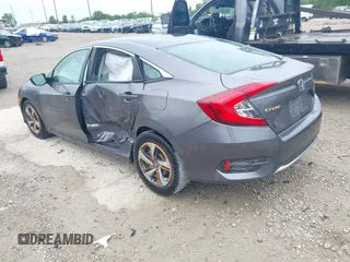 2020 Honda Civic LX z VIN 19XFC2F66LE012481, wystawiony jako IAAI lot #42297600 z przebiegiem 56 602 mil mil oraz . Historia ofert i sprzedaży dostępna na DreamBid. Obrazek 3.