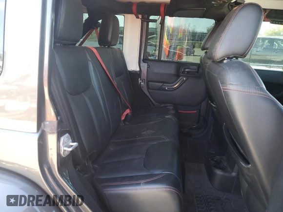 2017 Jeep Wrangler Unlimited Rubicon z VIN 1C4BJWFGXHL737844, wystawiony jako Copart lot #53044635 z przebiegiem 49 286 mil mil oraz Czysty tytuł • Clean title. Historia ofert i sprzedaży dostępna na DreamBid. Obrazek 11.