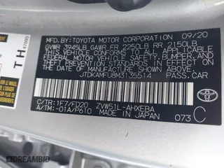 2021 Toyota Prius L Eco with VIN JTDKAMFU8M3135514, listed as a IAAI auction lot 40977114 with 70,451 mi miles. Bid and sale history available at carsss.com. Image 9.