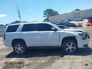2015 Chevrolet Tahoe LT with VIN 1GNSCBKC4FR648715, listed as a IAAI auction lot 42267719 with Not provided miles and . Bid and sale history available at DreamBid. Image 13.