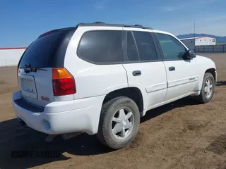 2003 GMC Envoy SLT with VIN 1GKDT13S232394707, listed as a IAAI auction lot 42084139 with 192,416 mi miles. Bid and sale history available at carsss.com. Image 4.