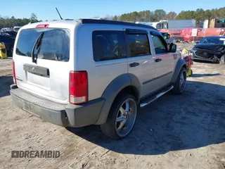 2007 Dodge Nitro SXT with VIN 1D8GT28K97W642118, listed as a IAAI auction lot 41276172 with 385,441 mi miles. Bid and sale history available at carsss.com. Image 4.
