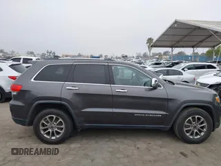 2014 Jeep Grand Cherokee Limited with VIN 1C4RJEBG0EC555774, listed as a IAAI auction lot 42160952 with 102,076 mi miles and . Bid and sale history available at DreamBid. Image 13.