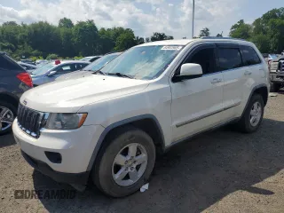 2011 Jeep Grand Cherokee Laredo with VIN 1J4RR4GG8BC572470, listed as a Copart auction lot 64953985 with 171,777 mi miles and Clean title. Bid and sale history available at DreamBid. Image 1.