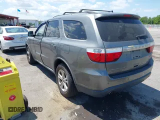 2011 Dodge Durango Crew with VIN 1D4SE4GT5BC639156, listed as a IAAI auction lot 42147490 with 204,285 mi miles and . Bid and sale history available at carsss.com. Image 3.