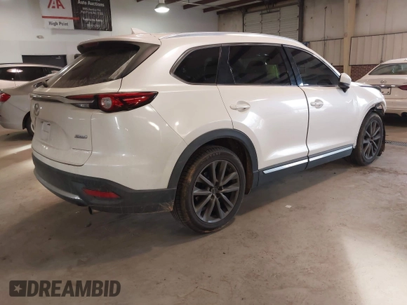 2017 Mazda CX-9 Grand Touring with VIN JM3TCADY5H0132572, listed as a IAAI auction lot 41421008 with 66,656 mi miles and . Bid and sale history available at DreamBid. Image 4.