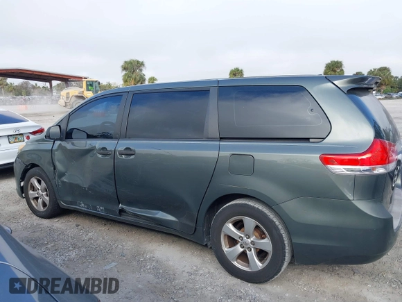 2014 Toyota Sienna L with VIN 5TDZK3DC6ES421278, listed as a IAAI auction lot 41178679 with 202,823 mi miles. Bid and sale history available at carsss.com. Image 14.