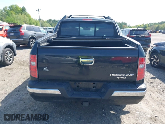 2010 Honda Ridgeline RTL z VIN 5FPYK1F56AB003730, wystawiony jako IAAI lot #42255351 z przebiegiem 190 630 mil mil oraz . Historia ofert i sprzedaży dostępna na DreamBid. Obrazek 16.
